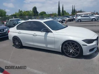 2014 BMW 3 Series 328i with VIN WBA3C1C52EK110753, listed as a IAAI auction lot 42444129 with 169,035 mi miles and . Bid and sale history available at DreamBid. Image 13.