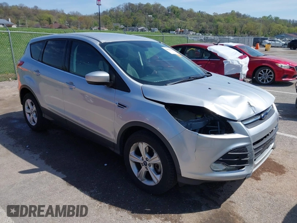 2016 Ford Escape SE with VIN 1FMCU9G98GUA10333, listed as a IAAI auction lot 42021490 with 128,973 mi miles. Bid and sale history available at carsss.com. Image 1.