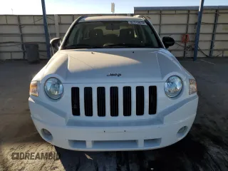 2009 Jeep Compass North with VIN 1J4FT47B79D160392, listed as a Copart auction lot 87213674 with 79,625 mi miles and Salvage Title. Bid and sale history available at carsss.com. Image 5.