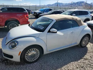 2014 Volkswagen Beetle 1.8T with VIN 3VW517AT4EM818949, listed as a Copart auction lot 49615915 with 103,682 mi miles and Salvage title. Bid and sale history available at DreamBid. Image 1.