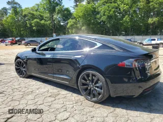 2017 Tesla Model S 100D with VIN 5YJSA1E28HF192397, listed as a Copart auction lot 55455995 with 90,534 mi miles and Salvage title. Bid and sale history available at DreamBid. Image 2.