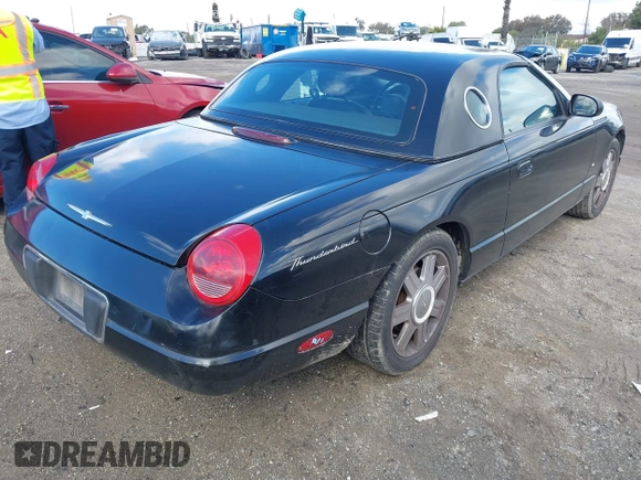 2004 Ford Thunderbird Deluxe z VIN 1FAHP60A64Y101843, wystawiony jako IAAI lot #41582696 z przebiegiem 146 492 mil mil oraz . Historia ofert i sprzedaży dostępna na DreamBid. Obrazek 4.