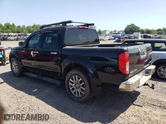 2010 Nissan Frontier Pro-4X with VIN 1N6AD0EV1AC447205, listed as a Copart auction lot 62007355 with 128,371 mi miles and Clean title. Bid and sale history available at DreamBid. Image 2.