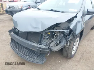 2014 Toyota Corolla L with VIN 2T1BURHE5EC027497, listed as a IAAI auction lot 42602880 with 101,094 mi miles and . Bid and sale history available at DreamBid. Image 6.
