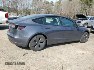 2023 Tesla Model 3 with VIN 5YJ3E1EA8PF699931, listed as a Copart auction lot 49293795 with 13,119 mi miles and Salvage Title. Bid and sale history available at DreamBid. Image 3.