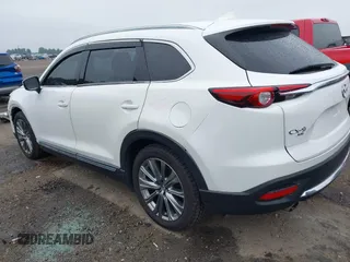 2021 Mazda CX-9 Signature with VIN JM3TCBEY4M0517118, listed as a IAAI auction lot 42400675 with 56,260 mi miles and . Bid and sale history available at DreamBid. Image 3.