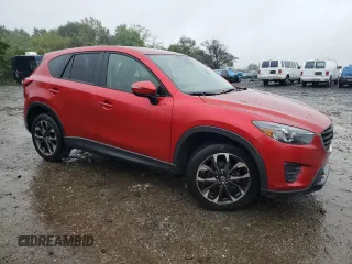 2016 Mazda CX-5 Grand Touring with VIN JM3KE4DY3G0713283, listed as a Copart auction lot 73346194 with 135,382 mi miles and Salvage Title. Bid and sale history available at carsss.com. Image 4.