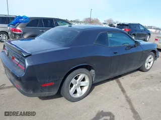 2016 Dodge Challenger SXT Plus with VIN 2C3CDZAGXGH264256, listed as a IAAI auction lot 41759183 with 128,358 mi miles. Bid and sale history available at carsss.com. Image 4.