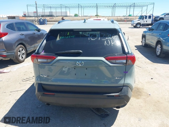 2021 Toyota RAV4 XLE Premium with VIN 2T3C1RFV0MW140682, listed as a IAAI auction lot 42315813 with 98,267 mi miles and . Bid and sale history available at DreamBid. Image 16.