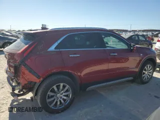 2022 Cadillac XT4 FWD Premium Luxury with VIN 1GYFZCR43NF154997, listed as a Copart auction lot 81942214 with 22,697 mi miles and Salvage title. Bid and sale history available at DreamBid. Image 3.
