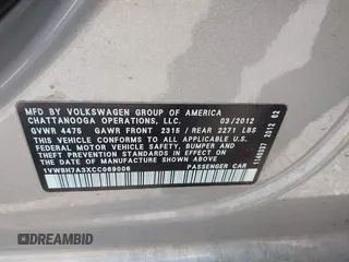 2012 Volkswagen Passat SE z VIN 1VWBH7A3XCC069006, wystawiony jako IAAI lot #42393437 z przebiegiem 157 039 mil mil oraz . Historia ofert i sprzedaży dostępna na DreamBid. Obrazek 9.
