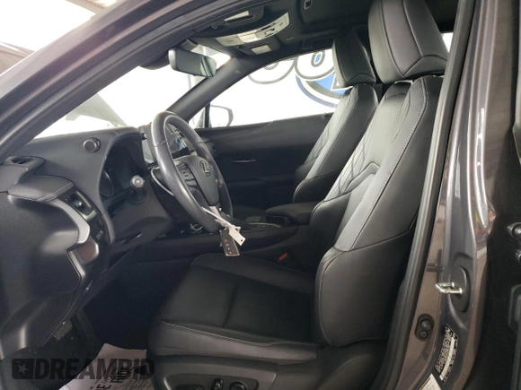2023 Lexus UX 250h F Sport with VIN JTHB9JBHXP2065586, listed as a Copart auction lot 59037755 with 23,620 mi miles and Salvage title. Bid and sale history available at DreamBid. Image 7.