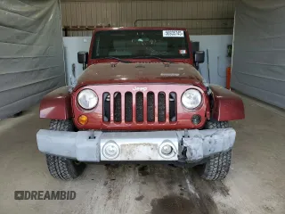 2010 Jeep Wrangler Sahara z VIN 1J4GA5D11AL106768, wystawiony jako Copart lot #56935745 z przebiegiem 143 212 mil mil oraz Szkoda całkowita • Salvage title. Historia ofert i sprzedaży dostępna na DreamBid. Obrazek 5.