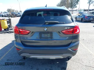 2018 BMW X1 sDrive28i with VIN WBXHU7C36J5L05628, listed as a IAAI auction lot 41708522 with 91,352 mi miles and . Bid and sale history available at DreamBid. Image 17.