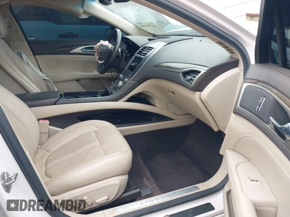 2017 Lincoln MKZ Reserve z VIN 3LN6L5E9XHR619962, wystawiony jako IAAI lot #41791188 z przebiegiem 143 955 mil mil oraz . Historia ofert i sprzedaży dostępna na DreamBid. Obrazek 5.