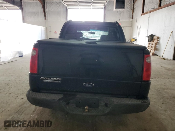 2005 Ford Explorer Sport Trac XLS with VIN 1FMDU77KX5UB63725, listed as a Copart auction lot 49386155 with 165,293 mi miles and Salvage title. Bid and sale history available at DreamBid. Image 6.