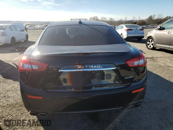 2017 Maserati Ghibli with VIN ZAM57XSS2H1249720, listed as a Copart auction lot 80409684 with 56,769 mi miles and Salvage Title. Bid and sale history available at carsss.com. Image 6.