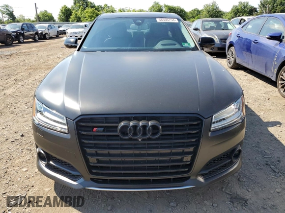 2015 Audi S8 z VIN WAUK2AFD3FN015524, wystawiony jako Copart lot #58506754 z przebiegiem 69 866 mil mil oraz Szkody całkowita. Historia ofert i sprzedaży dostępna na DreamBid. Obrazek 5.