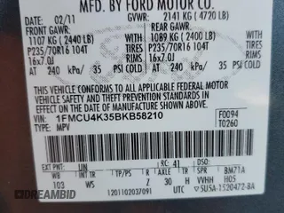 2011 Ford Escape Hybrid z VIN 1FMCU4K35BKB58210, wystawiony jako Copart lot #42141165 z przebiegiem 175 636 mil mil oraz Nie do naprawy • Non repairable. Historia ofert i sprzedaży dostępna na DreamBid. Obrazek 14.