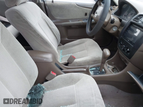 2000 Mazda Protege DX with VIN JM1BJ2225Y0255349, listed as a IAAI auction lot 41604895 with Not Provided miles and . Bid and sale history available at DreamBid. Image 5.