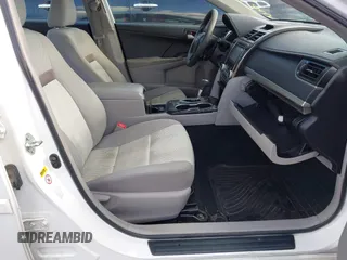 2014 Toyota Camry L with VIN 4T4BF1FK1ER424875, listed as a IAAI auction lot 42025877 with 113,919 mi miles. Bid and sale history available at carsss.com. Image 5.