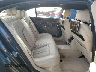 2016 BMW 7 Series 740i z VIN WBA7E2C53GG504611, wystawiony jako Copart lot #42253395 z przebiegiem 35 965 mil mil oraz Szkoda całkowita • Salvage title. Historia ofert i sprzedaży dostępna na DreamBid. Obrazek 10.