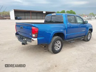 2018 Toyota Tacoma SR5 with VIN 3TMAZ5CNXJM069212, listed as a IAAI auction lot 42010564 with 73,825 mi miles and . Bid and sale history available at DreamBid. Image 4.