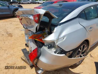 2016 Nissan Maxima SR with VIN 1N4AA6AP7GC389606, listed as a IAAI auction lot 42451614 with 114,957 mi miles and . Bid and sale history available at DreamBid. Image 6.