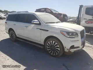2022 Lincoln Navigator Black Label with VIN 5LMJJ2TT4NEL09900, listed as a Copart auction lot 74687794 with 0 mi miles and Salvage Title. Bid and sale history available at carsss.com. Image 4.