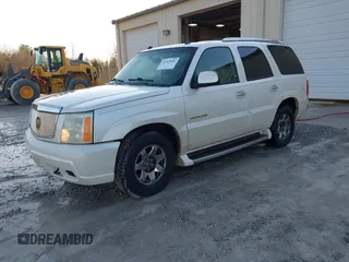 2004 Cadillac Escalade z VIN 1GYEC63T64R231552, wystawiony jako IAAI lot #41428401 z przebiegiem 275 724 mil mil oraz . Historia ofert i sprzedaży dostępna na DreamBid. Obrazek 2.