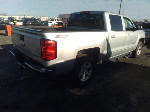 2015 Chevrolet Silverado 1500 LT with VIN 3GCUKREC7FG138643, listed as a IAAI auction lot 41582933 with 112,771 mi miles. Bid and sale history available at carsss.com. Image 4.