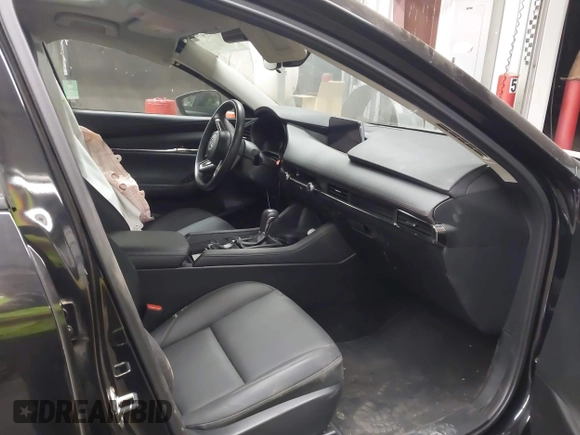2023 Mazda 3 S Preferred with VIN 3MZBPACM5PM369790, listed as a IAAI auction lot 41612983 with 9,789 mi miles and . Bid and sale history available at DreamBid. Image 5.