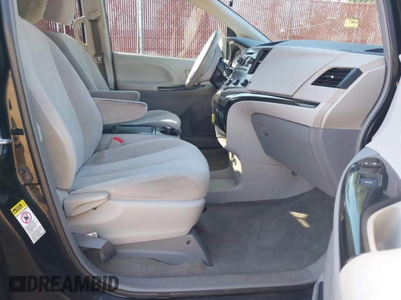 2012 Toyota Sienna LE AAS with VIN 5TDKK3DC6CS238848, listed as a IAAI auction lot 41728728 with 142,240 mi miles. Bid and sale history available at carsss.com. Image 5.