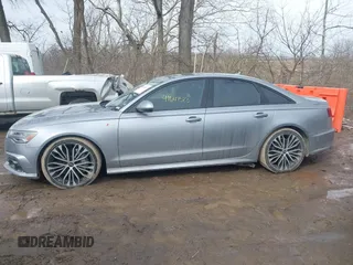 2017 Audi A6 Premium Plus z VIN WAUF2AFC7HN007745, wystawiony jako IAAI lot #41647523 z przebiegiem 119 837 mil mil oraz . Historia ofert i sprzedaży dostępna na DreamBid. Obrazek 14.