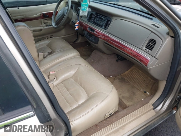 2001 Mercury Grand Marquis LS z VIN 2MEFM75W11X610723, wystawiony jako IAAI lot #42208567 z przebiegiem 190 397 mil mil oraz . Historia ofert i sprzedaży dostępna na DreamBid. Obrazek 5.