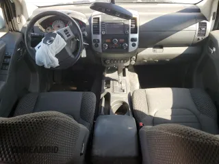 2018 Nissan Frontier Pro-4X with VIN 1N6AD0EV1JN715111, listed as a Copart auction lot 54012255 with 127,409 mi miles and Salvage title. Bid and sale history available at DreamBid. Image 8.