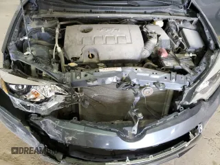 2016 Toyota Corolla L z VIN 5YFBURHE6GP411923, wystawiony jako Copart lot #52326335 z przebiegiem 92 981 mil mil oraz Szkoda całkowita • Salvage title. Historia ofert i sprzedaży dostępna na DreamBid. Obrazek 11.