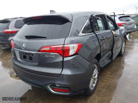 2017 Acura RDX w/Technology Pkg with VIN 5J8TB3H57HL022064, listed as a IAAI auction lot 41551579 with 77,928 mi miles. Bid and sale history available at carsss.com. Image 4.