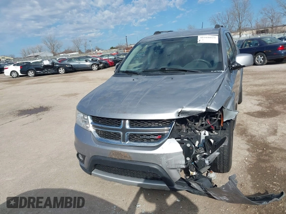 2017 Dodge Journey SXT z VIN 3C4PDDBG6HT595309, wystawiony jako IAAI lot #41918029 z przebiegiem 127 247 mil mil oraz . Historia ofert i sprzedaży dostępna na DreamBid. Obrazek 12.