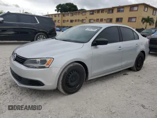 2014 Volkswagen Jetta S with VIN 3VW2K7AJ4EM290005, listed as a Copart auction lot 63467095 with 153,292 mi miles and Clean title. Bid and sale history available at DreamBid. Image 1.