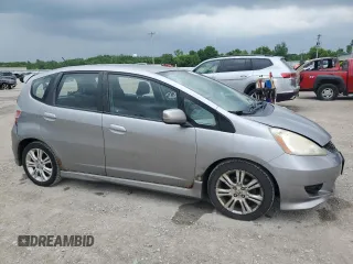 2009 Honda Fit Sport with VIN JHMGE88469S064405, listed as a Copart auction lot 61413745 with 179,497 mi miles and Salvage title. Bid and sale history available at DreamBid. Image 4.