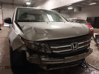 2012 Honda Odyssey LX with VIN 5FNRL5H27CB092988, listed as a IAAI auction lot 41933507 with 123,233 mi miles and . Bid and sale history available at DreamBid. Image 6.