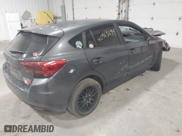 2018 Subaru Impreza with VIN 4S3GTAA65J3713216, listed as a IAAI auction lot 40963294 with 94,176 mi miles and . Bid and sale history available at DreamBid. Image 4.