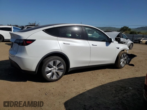 2024 Tesla Model Y Long Range with VIN 7SAYGDEE0RF081948, listed as a Copart auction lot 52612805 with 12,099 mi miles and Salvage Title. Bid and sale history available at DreamBid. Image 3.