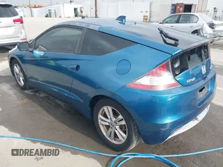 2012 Honda CR-Z with VIN JHMZF1D45CS004237, listed as a IAAI auction lot 42598638 with 60,896 mi miles and . Bid and sale history available at DreamBid. Image 3.