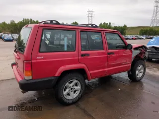 1999 Jeep Cherokee Sport with VIN 1J4FF68S2XL648735, listed as a Copart auction lot 58758115 with 252,248 mi miles and Salvage title. Bid and sale history available at DreamBid. Image 3.