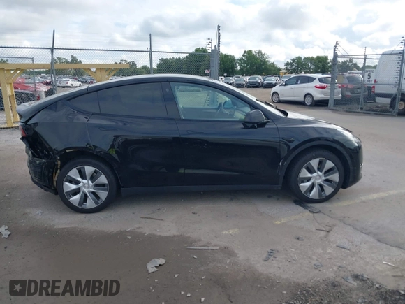 2023 Tesla Model Y Long Range with VIN 7SAYGDEE2PA044328, listed as a IAAI auction lot 42427625 with 41,324 mi miles and . Bid and sale history available at DreamBid. Image 13.