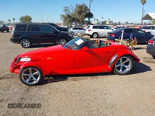 1999 Plymouth Prowler z VIN 1P3EW65G4XV503282, wystawiony jako IAAI lot #41282258 z przebiegiem 58 866 mil mil oraz . Historia ofert i sprzedaży dostępna na DreamBid. Obrazek 14.