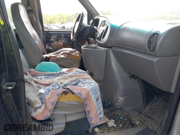 1999 Ford Econoline Passenger XL with VIN 1FBSS31LXXHB58391, listed as a IAAI auction lot 42031661 with 263,067 mi miles and . Bid and sale history available at DreamBid. Image 5.