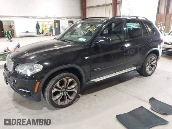 2012 BMW X5 50i with VIN 5UXZV8C50CL425721, listed as a IAAI auction lot 42590676 with 192,355 mi miles and . Bid and sale history available at DreamBid. Image 17.